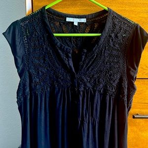 Black lace detail sleeveless shirt.